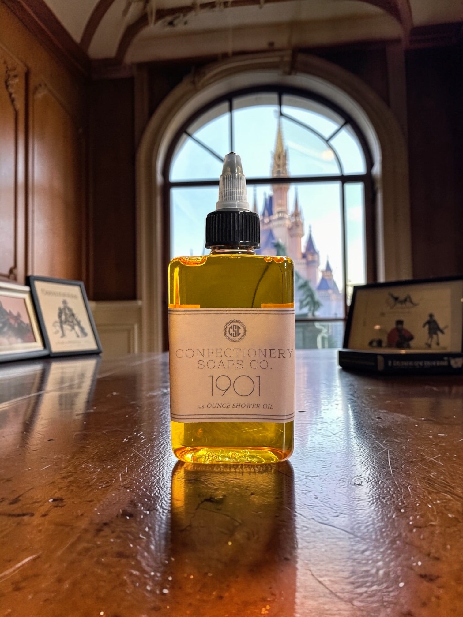 Bottle of Confectionery Soaps Co. 1901 soap on a wooden table with a castle in the background